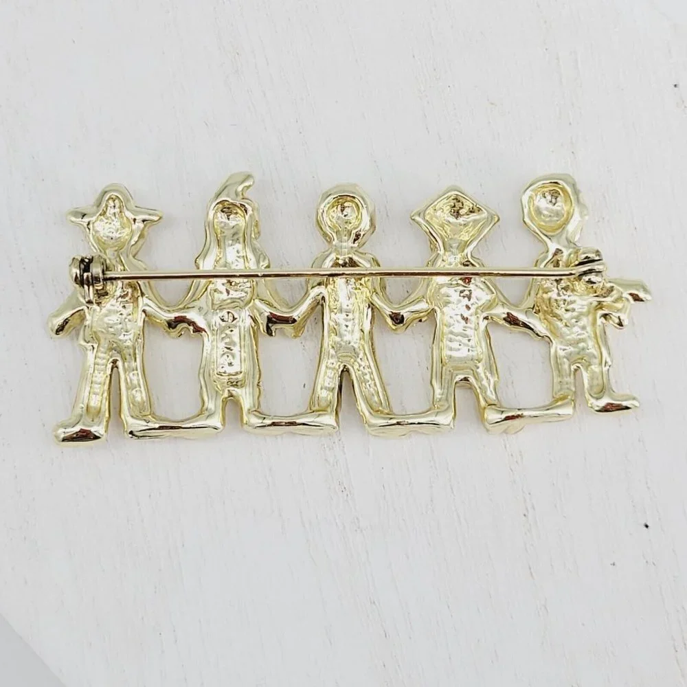 AJC American Jewelry Co. Children Of The World Brooch Satin & Polished Gold Tone